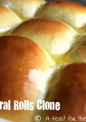 A pan of butter brushed Corral Yeast Rolls