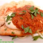 This Chicken Parmigiana is an Italian classic quick and easy way to turn boring chicken into something flavorful. Yes, you can use bottled pasta sauce, or make my homemade version. Served over pasta, this is a delicious dinner that even kids will love.