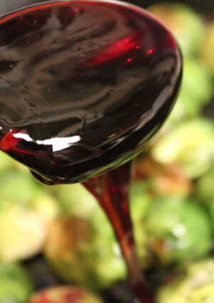 A jar of ruby red pomegranate molasses
