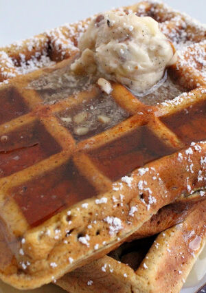 These homemade waffles are reminiscent of gingerbread cookies, while the pumpkin adds plenty of moisture. I like to make Vanilla Bean-Pecan Butter to top this with. This is perfect for Christmas morning-- or any time of year.