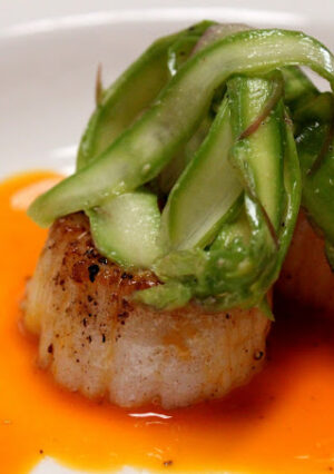 Succulent Scallops in a Carrot, Orange and Cardamon Sauce is an upscale, restaurant quality dinner you can make at home. For a fancy finish, shaved asparagus in a simple vinaigrette makes a beautiful presentation.