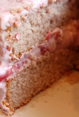 This Homemade Strawberry Cake is not made with box cake mix and jello. I much prefer to make cakes the old-fashioned way, with pantry ingredients and real strawberries. The frosting is a blend of butter and cream cheese. Strawberry pulp turns the frosting a pretty pink, with bits of strawberries. This cake is a show stopper! The frosting was off-the-charts delicious!