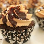 The Best  Chocolate Cupcakes with Peanut Butter Frosting and Fudge Sauce