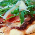 Fig-Prosciutto Gourmet Pizza with Arugula and Shaved Parmesan