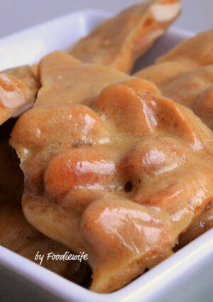 A bowl of peanut brittle.