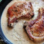 Comforting and Easy Smothered Pork Chops with a Buttermilk Onion Gravy