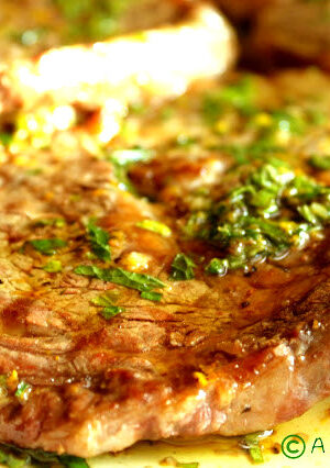 Bistecca alla Fiorentia is one of the most celebrated dishes in Tuscany. A Porterhouse cut of beef is most traditional. Rib-Eye steak is a great alternative, because it has a lot of marbling. These beautifully grilled steaks with olive oil, herbs of fresh basil and mint, and orange zest is so flavorful. The simple orange pickled shallots makes a flavorful condiment to the beef.