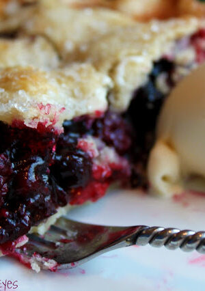 This berry fruit pie is bursting with flavors of raspberries, blueberries and olallieberries (or blackberries). The pie crust is ultra-tender and bakes flaky and golden. This is a perfect summer pie, with a scoop of vanilla ice cream. I'll tell you a little secret. You can definitely use frozen berries in the winter, and bring a little summer flavors into your kitchen.