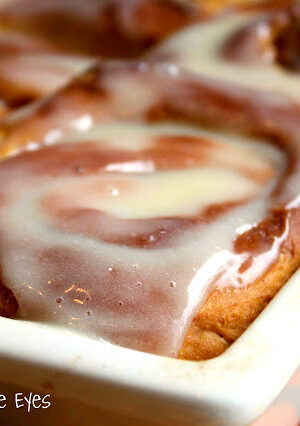 These homemade Sweet Potato Cinnamon Rolls are superb! The mashed sweet potatoes gives extra tenderness and moisture to this dough, and it also adds a pretty color. These are filled with a buttery cinnamon filling, and then iced with a cream cheese frosting, while piping hot. Bet you can't eat just one!