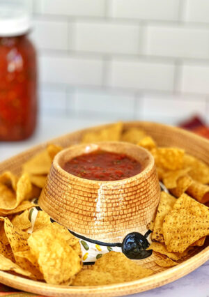 This recipe is simple to make your own Restaurant Style Salsa. This salsa uses canned tomatoes and it tastes fresh and just as good as any restaurant salsa–so you can make this all year around! You can adjust the amount of kick you want, by the amount of jalapeno…or, you can leave out the jalapeno altogether