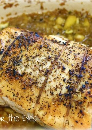 This French Pot-Roasted Pork Loin is actually called Enchaud Perigordine in France. I was surprised at how easy it was to butterfly the pork loin roast, myself. Thin garlic slices are cooked in butter, and are rubbed inside the roast. The roast is rolled up and tied, seared and slow roasted on a bed of apples, onion, garlic, herbs and white wine. In France a pig's foot is added to the roast, but this recipe has a "secret" ingredient that mimics the texture, without having to add a "trotter to it. This is perfect for a Sunday dinner and fancy enough for company.