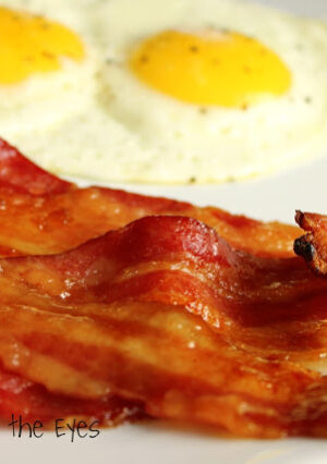 Perfect Oven-Fried Bacon is truly a revelation! Instead of frying bacon, in a pan, the oven cooks the bacon more evenly. To add a sweet and savory element to the bacon, an even sprinkling of brown sugar makes the most incredible candied bacon! I'll show you how clean up can be a snap. Now that I own an Air Fryer, I can cook smaller batches of bacon in no time at all.