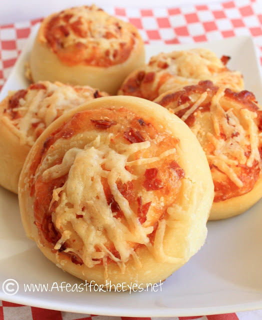Pizza Wheels (aka Party Pizza Buns) are a fun hand held pizza that are fun to make. These aren’t difficult to make, and they are terrific for a party or just a hand-held snack. The dough isn't terribly difficult to make. Pepperoni pizza rules in our home, but these are adaptable to any of your favorite fillings.