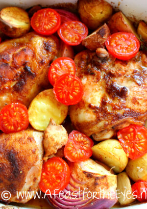 Baked Paprika Chicken Thighs with Potatoes and Tomatoes