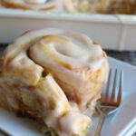 A pan of frosted Cinnamon Rolls