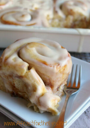 A pan of frosted Cinnamon Rolls