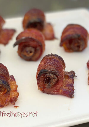 bacon wrapped dates, stuffed with roasted garlic cloves appetizer