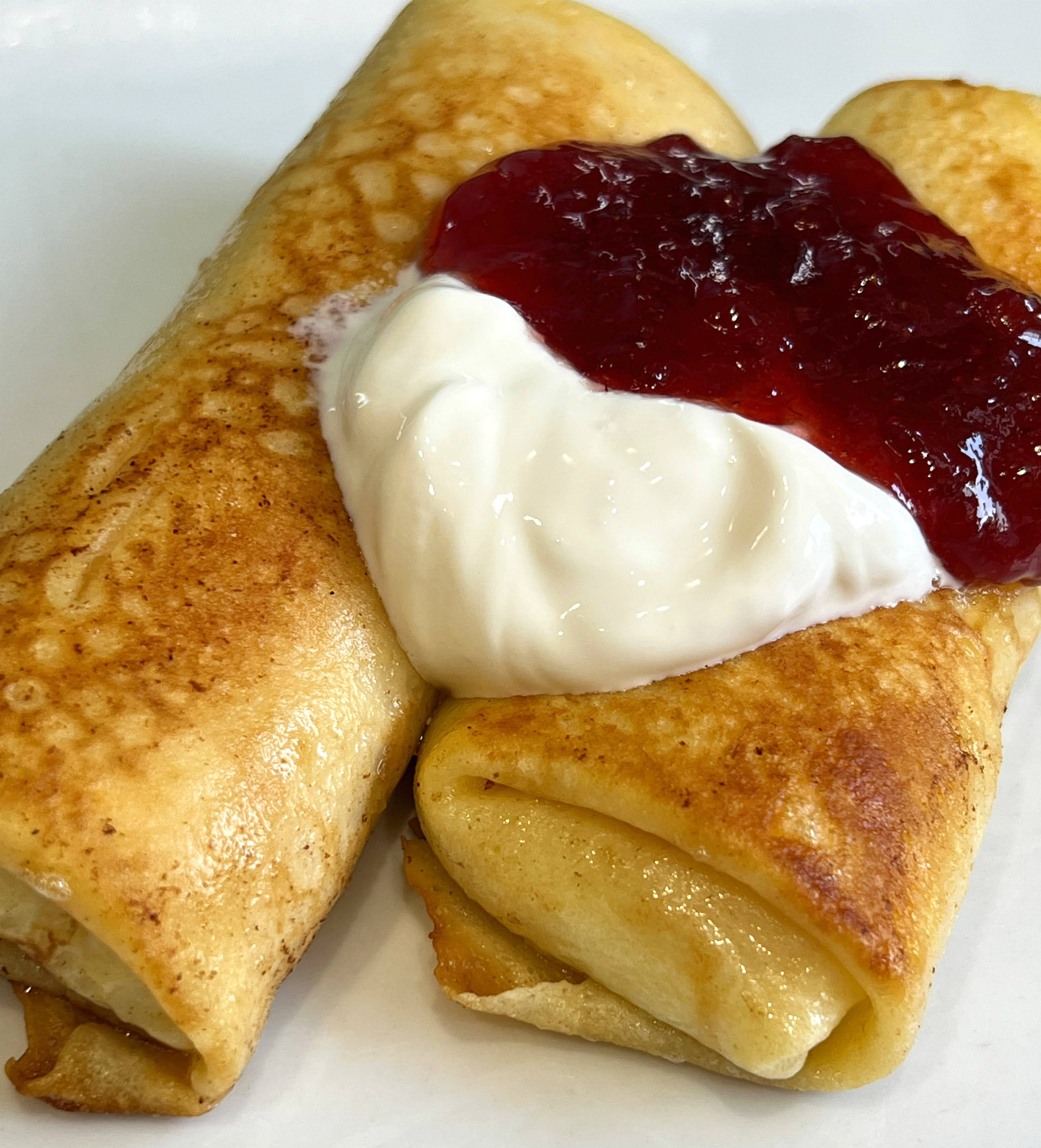 How To Make Perfect Cheese Blintzes With Strawberries And Sour Cream