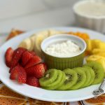 Healthy Rainbow Fresh Fruit Place with a Cream Cheese Dip and Banana Sauce