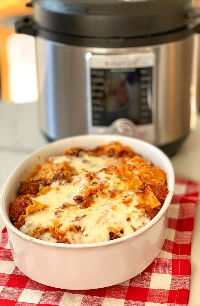 This recipe is perfect for a busy cook. It takes 15 minutes of prep work to brown ground beef and sausage and to add some seasoning. Toss some lasagna noodles into the pot, pasta sauce and 5 minutes of pressure cooking. Add some ricotta cheese and Mozzarella, and dinner is ready in 30 minutes or less!