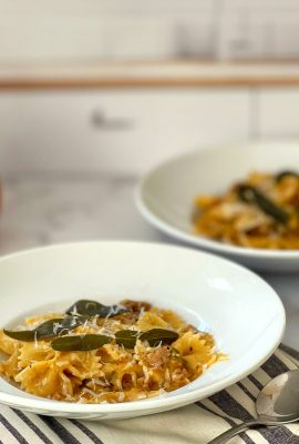 This pasta with a Pumpkin Cream sauce, sausage and sage is a comforting fall dish. Even if you claim you don't like pumpkin, this recipe could change your mind. The cream sauce is savory and unctuous. This recipe isn't too complicated to make, so it's perfect for a busy dinner night meal.