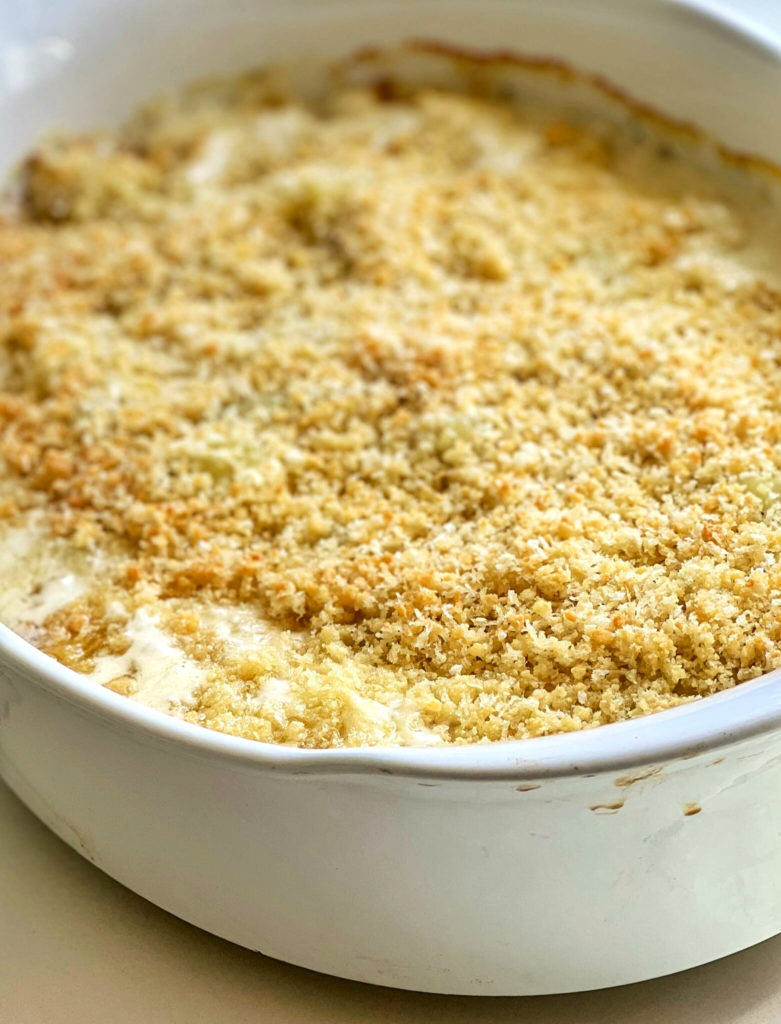 This Creamy Lighthouse Inn Potato Casserole is a potato lover's dream. It's decadent with a creamy, lightly garlic infused sauce. Topped with a crunchy, buttery, and savory Parmesan and panko topping will easily become your favorite side dish for any occasion.
