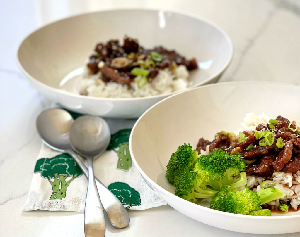 Mongolian Beef is a delicious Asian dish coated with a soy, ginger and garlic sauce. This recipe comes together faster than you can order Chinese take out.  Served with rice, it's a flavorful meal that you can make at home. 
