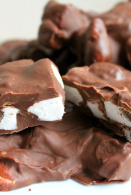 Homemade Rocky Road Candy is so simple to make. The beauty of this chocolate candy recipe, is that it's so versatile. My version is made with Belgian milk chocolate, macadamia nuts and plenty of marshmallow. Feel free to switch things up with dark chocolate, peanuts or pecans-- but don't leave out the marshmallows!
