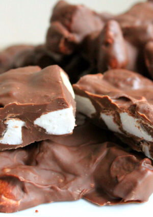 Homemade Rocky Road Candy is so simple to make. The beauty of this chocolate candy recipe, is that it's so versatile. My version is made with Belgian milk chocolate, macadamia nuts and plenty of marshmallow. Feel free to switch things up with dark chocolate, peanuts or pecans-- but don't leave out the marshmallows!