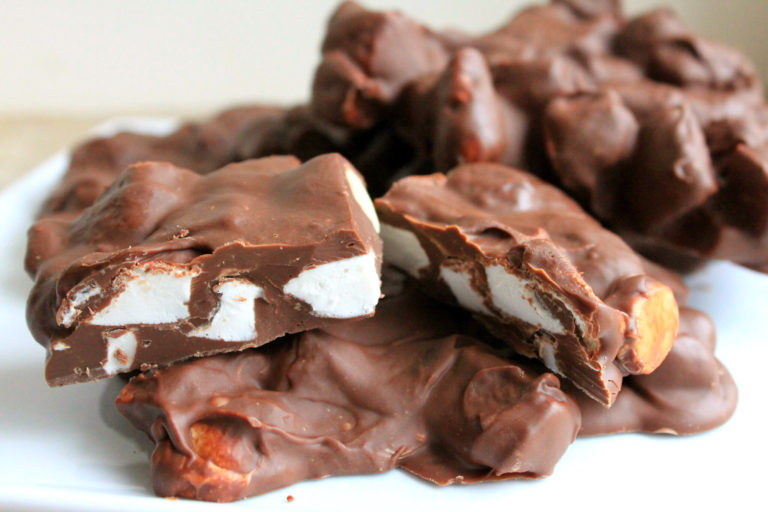 Homemade Rocky Road Candy is so simple to make. The beauty of this chocolate candy recipe, is that it's so versatile. My version is made with Belgian milk chocolate, macadamia nuts and plenty of marshmallow. Feel free to switch things up with dark chocolate, peanuts or pecans-- but don't leave out the marshmallows!