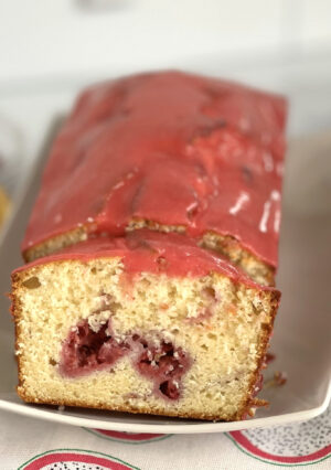 This Lemon Raspberry Loaf Cake is bursting with lemon flavor, and a slight tartness from fresh raspberries. The sour cream, in the batter, adds extra moisture. The luscious Pink Raspberry Glaze is the crowning glory!