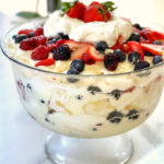 This Creamy Berry Trifle is a luscious dessert that is light and delicious. There's a layer of Angel Food Cake, homemade White Chocolate Pudding, fresh berries and fresh whipped cream. You can take a shortcut, using store bought cake, boxed pudding and dairy topping. I made the pudding and baked the cake a day before. It took minutes to make this beautiful trifle, and my guests loved it!