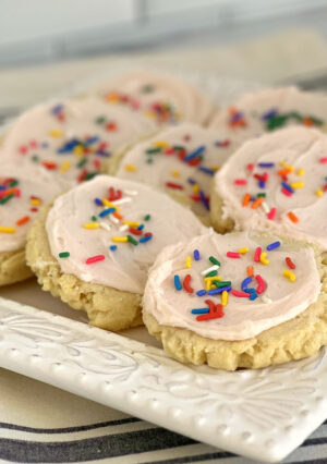 Swig Soft Sugar Cookies became famous at the Utah Swig Soda Shops. They are a thick, soft sugar with a sweet and creamy sour cream frosting. The cookies have rough edges that are slightly crisp. They cookies have a buttery taste, are very soft and the luscious frosting is perfection.
