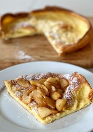 This Dutch Baby Pancake is such a simple batter to make. With this version, fresh apples are sliced, sauteed in butter, brown sugar and cinnamon-- plus an extra ingredient (in the printable recipe card). These are perfect for a fall breakfast or brunch.