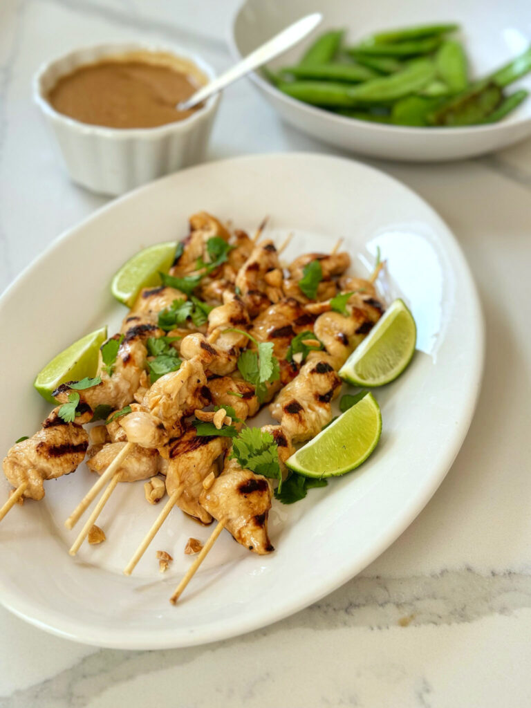 Chicken satay is a popular Southeast Asian dish that consists of marinated, skewered, and grilled chicken, typically served with a flavorful peanut sauce. The chicken marinade is really flavorful as is the peanut sauce. Both are quite easy to make. The skewers can be a fun appetizer or a full meal, served with sticky rice.