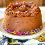 Yellow Cake with a Luscious Chocolate Frosting makes a perfect birthday cake. This recipe doesn't come from a box, either! This classic cake is everything you'd want to celebrate your birthday-- or for any occasion. It's perfect in every way-- tender, moist and delicious. The frosting is chocolate, silky with a surprise ingredient that really amps up the chocolate flavor.