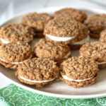 These Oatmeal Cream Pies have a creamy marshmallow filling that is irresistible. These remind me of Little Debbie Oatmeal Creme Pies. Best of all, you can bake them, fresh, at home. They are so good!