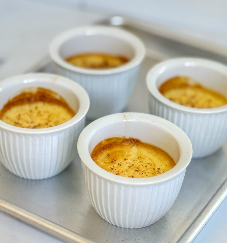 Ramekins of baked egg custard.