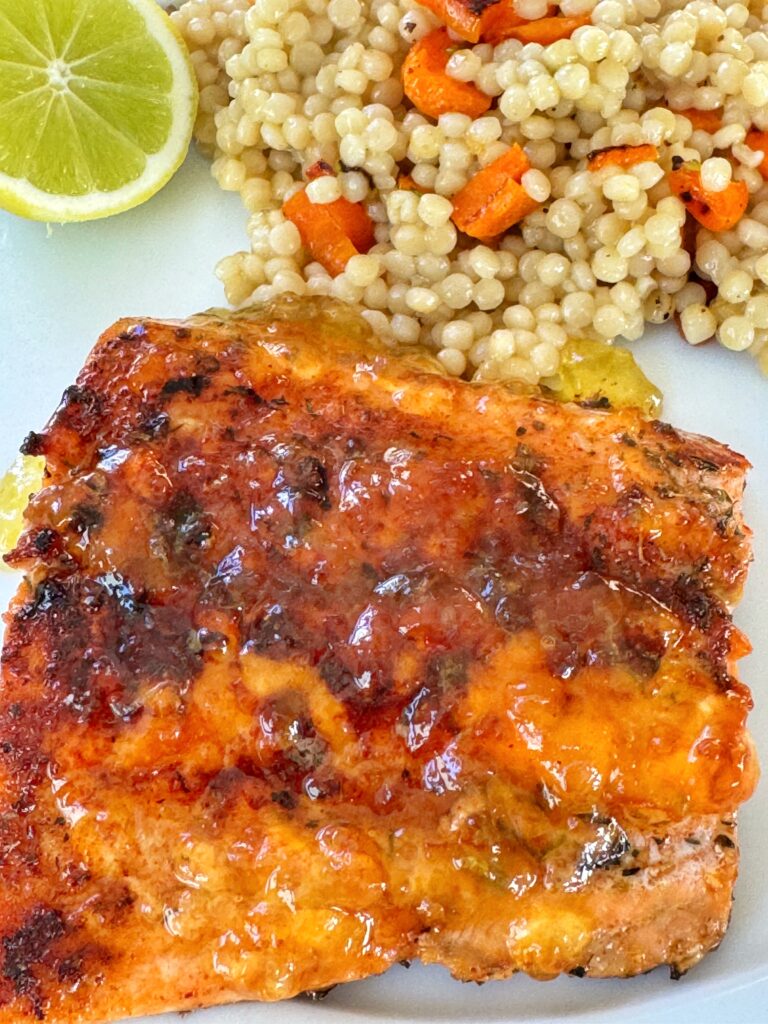 Seared and caramelized salmon with an orange marmalade and lime glaze.