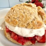 Strawberry biscuit filled with berries and whipped cream.